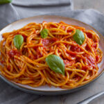 	Espaguetis con tomate
